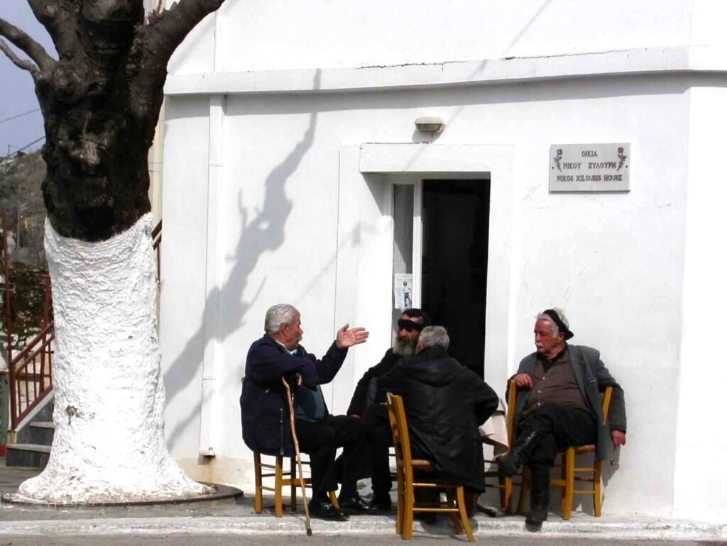 Locals at the Cretan village of Anogeia, Crete. 