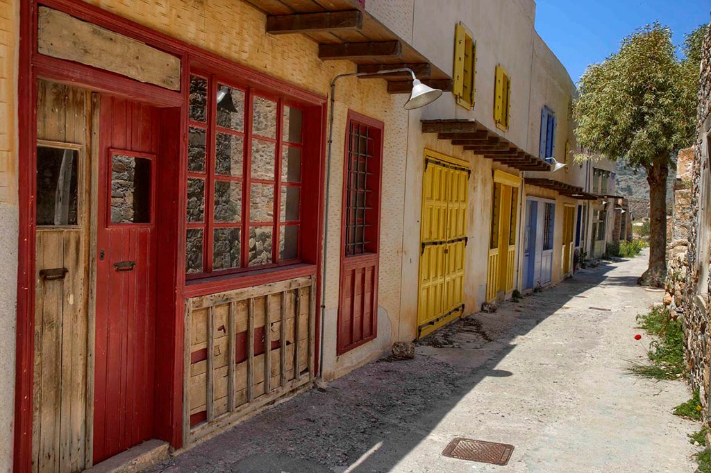 Shops and cafes on the main street of the settlement. Credit: spinalonga-island.gr and Ephorate of Antiquities of Lasithi