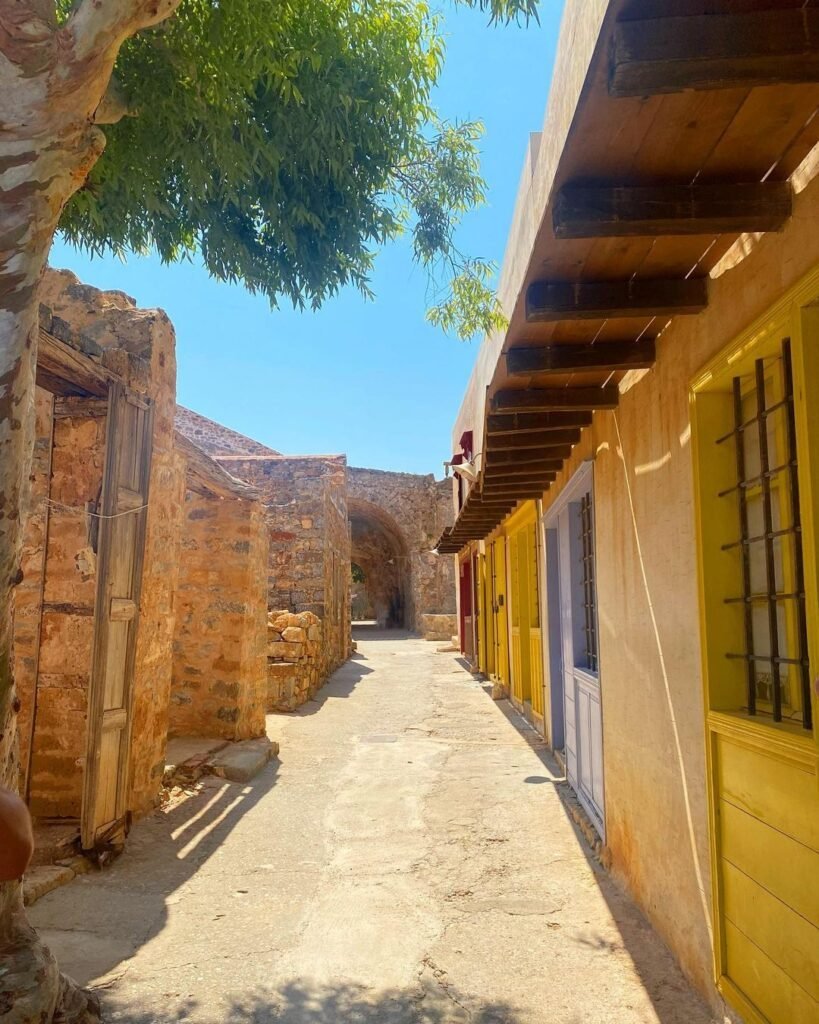 Shops on the main street of the Leprosy settlement on Spinalonga Island, Lasithi, Crete, Greece. 