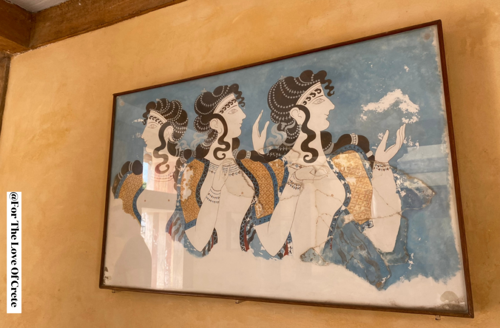 The Ladies in Blue fresco from Knossos reveals the sophistication of Minoan fashion, showing three noblewomen in intricate blue robes engaged in what appears to be a lively social gathering.