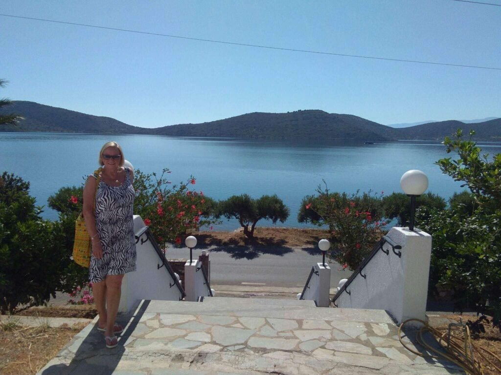 Juliet, book author of Footsteps of Fate, outside Tasmania Village, Elounda, Crete.