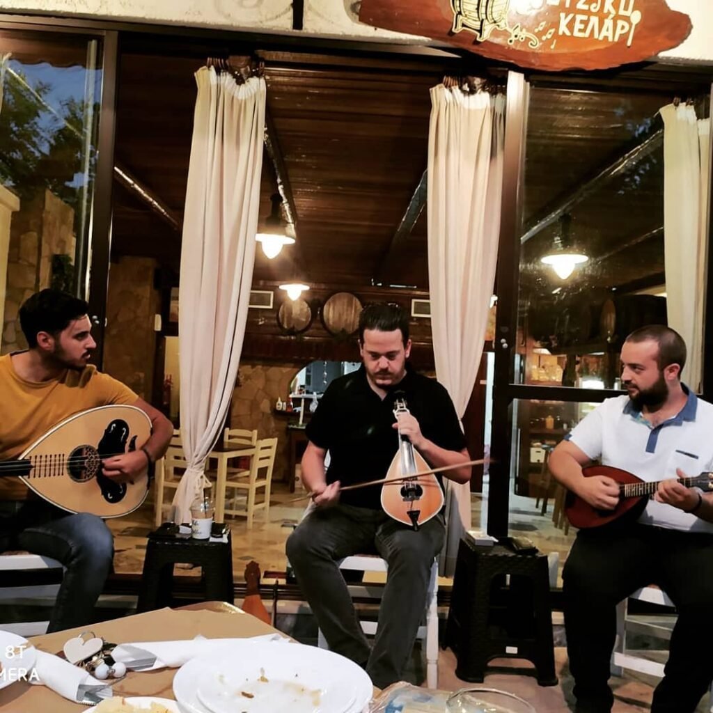 @athivoles_trio performing at Mousiko Kelari in Heraklion, Crete, with the soulful sounds of the Cretan lyra and laouto.