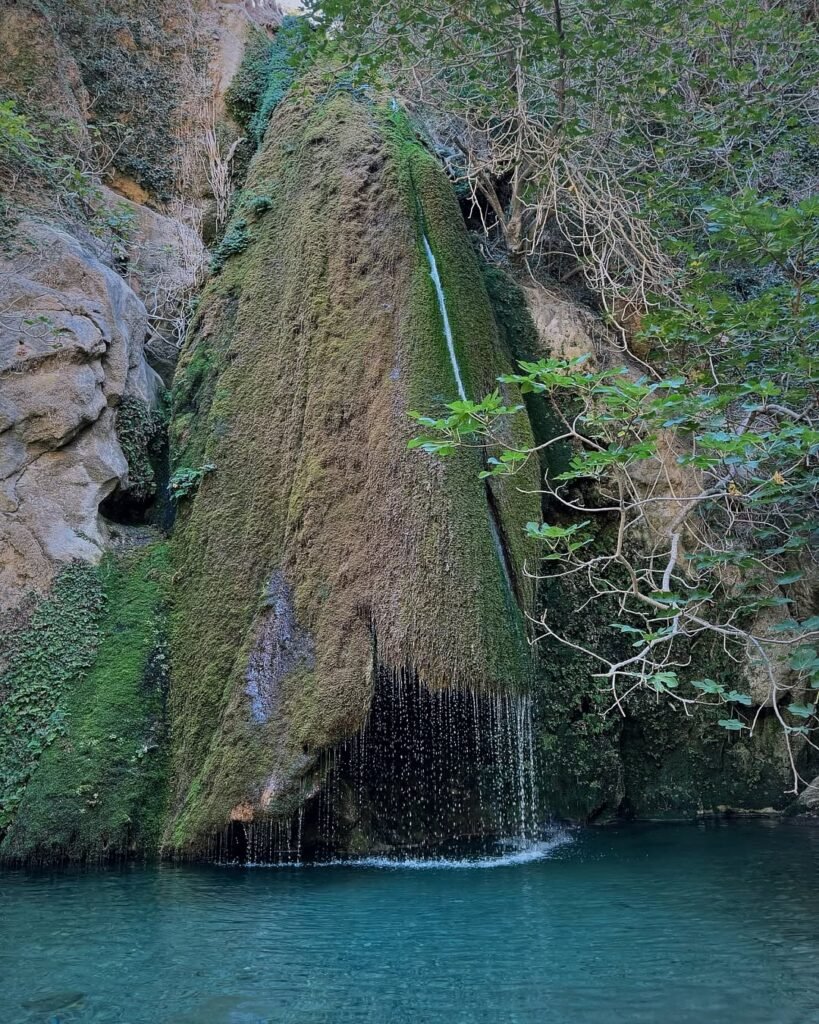 The magnificent 20-meter waterfall at Richtis Gorge, Lasithi, Crete.