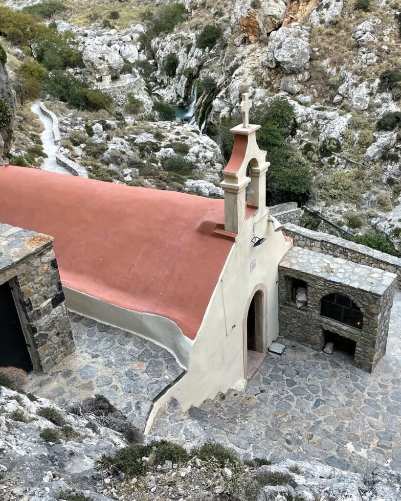 Nestled within Kourtaliotiko Gorge, Agios Nikolaos Chapel stands as a quiet sanctuary amid the rugged landscape. A place of reflection, history, and natural beauty.