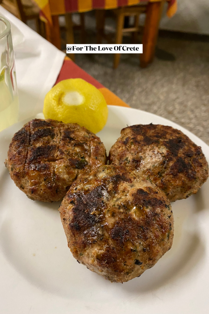 Juicy, herb-infused Greek meat patties (biftekia), grilled to perfection and served with a squeeze of fresh lemon for an explosion of Mediterranean flavors.