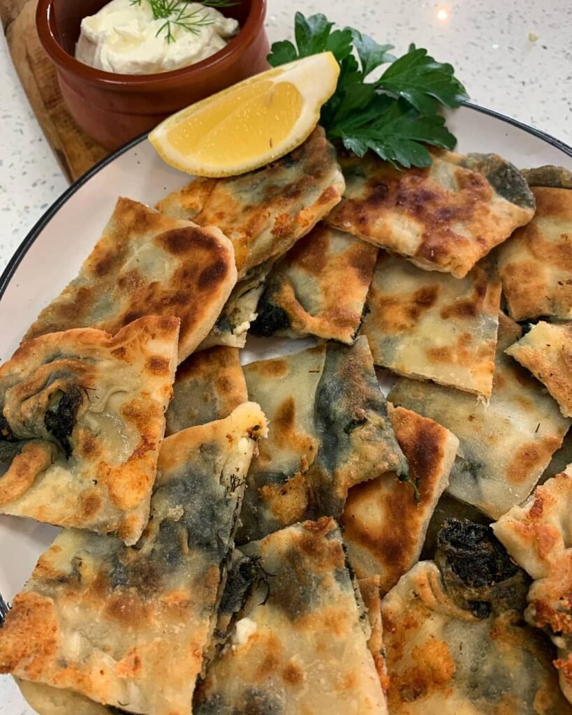Thin, flaky pies filled with wild fennel and fresh greens, these hand-rolled treasures are a seasonal specialty found in Crete’s villages. 