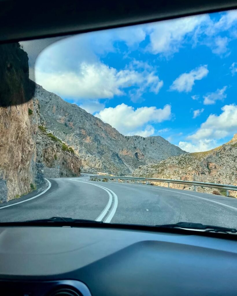 The winding road to Kourtaliotiko Gorge offers breathtaking views at every turn.