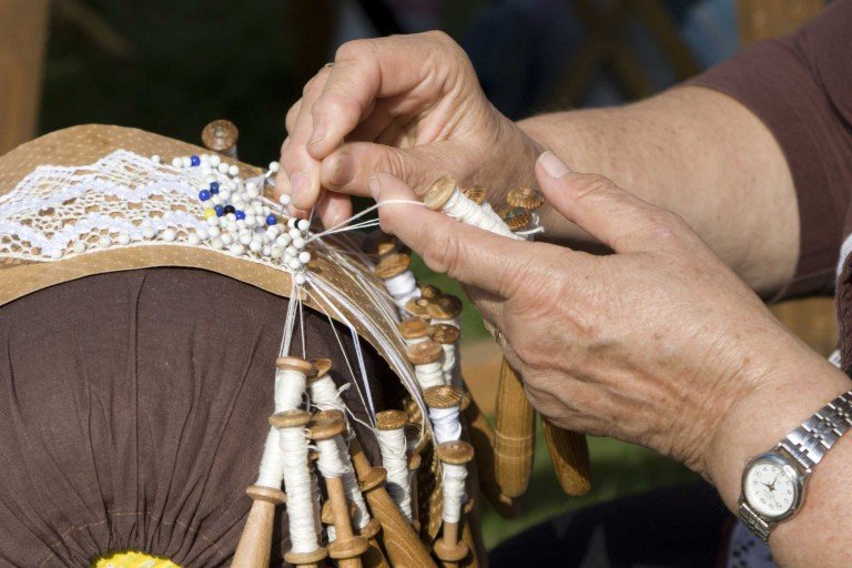 Creating kopaneli lace is one of the most delicate crafts in Crete—woven from memory, tradition, and the rhythmic dance of wooden bobbins.