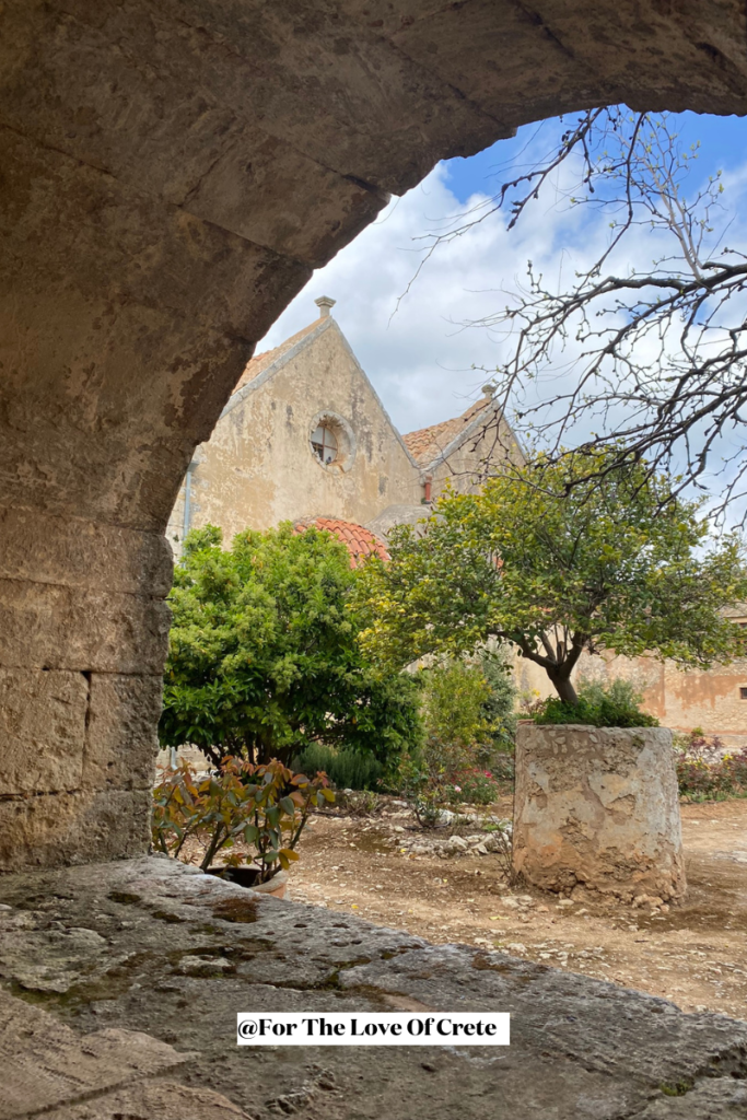 Even with its heavy history, Arkadi remains a serene and well-kept monastery surrounded by trees and traditional stonework.