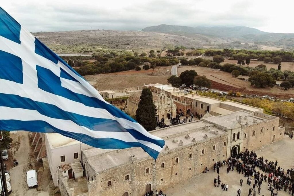The Greek flag flies high above Arkadi Monastery, a powerful symbol of the courage and sacrifice remembered here.