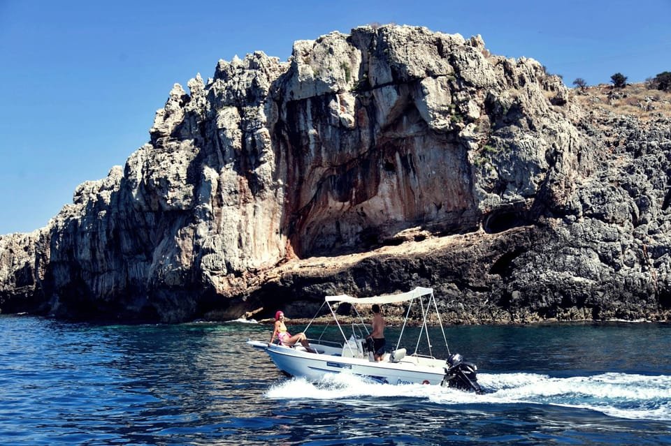 Captain your own adventure from Kalyves and explore Crete’s hidden coastal gems—no license needed! Discover secret coves and dramatic cliffs like these at your own pace.