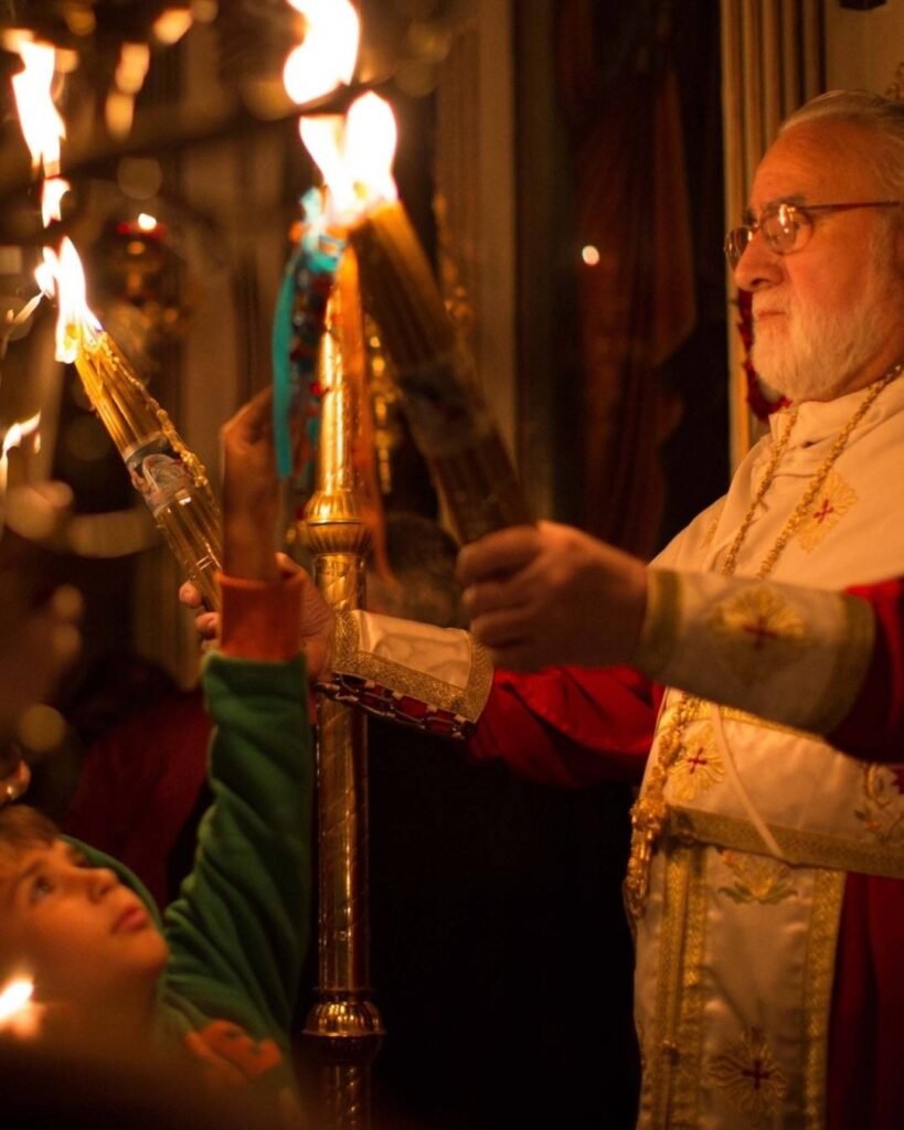 Respect and reverence are at the heart of Orthodox Easter in Crete. Modest dress and quiet participation are appreciated during church services, where moments like this—sharing the Holy Flame—carry deep spiritual meaning.