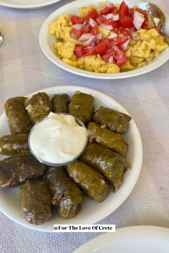 Creamy fava topped with fresh tomato and onion, and tender dolmadakia with a dollop of Greek yogurt, just one of many memorable meals at Giannousakis Taverna in Margarites, Rethymno.
