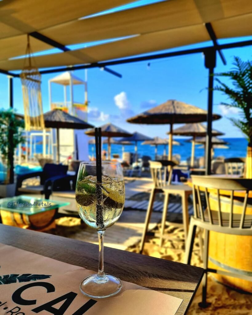 Lazy afternoons in Crete, with the sound of the waves and a cool drink in hand – just a taste of what awaits in 2025. Tourism in Crete is set for a record-breaking year, and moments like this are calling. 