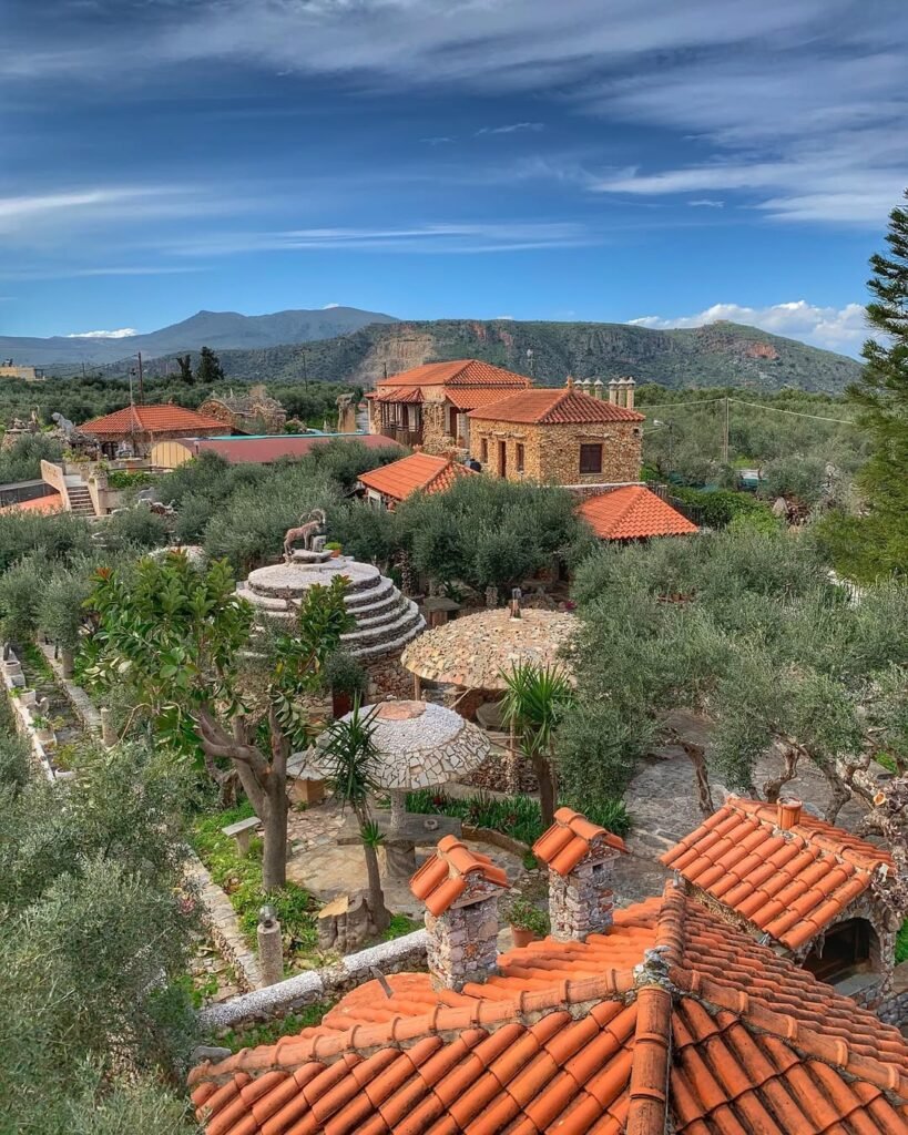 A hidden world of stone artistry surrounded by olive trees and mountain views—Koumos is a one-of-a-kind cultural treasure just steps from Kalyves.