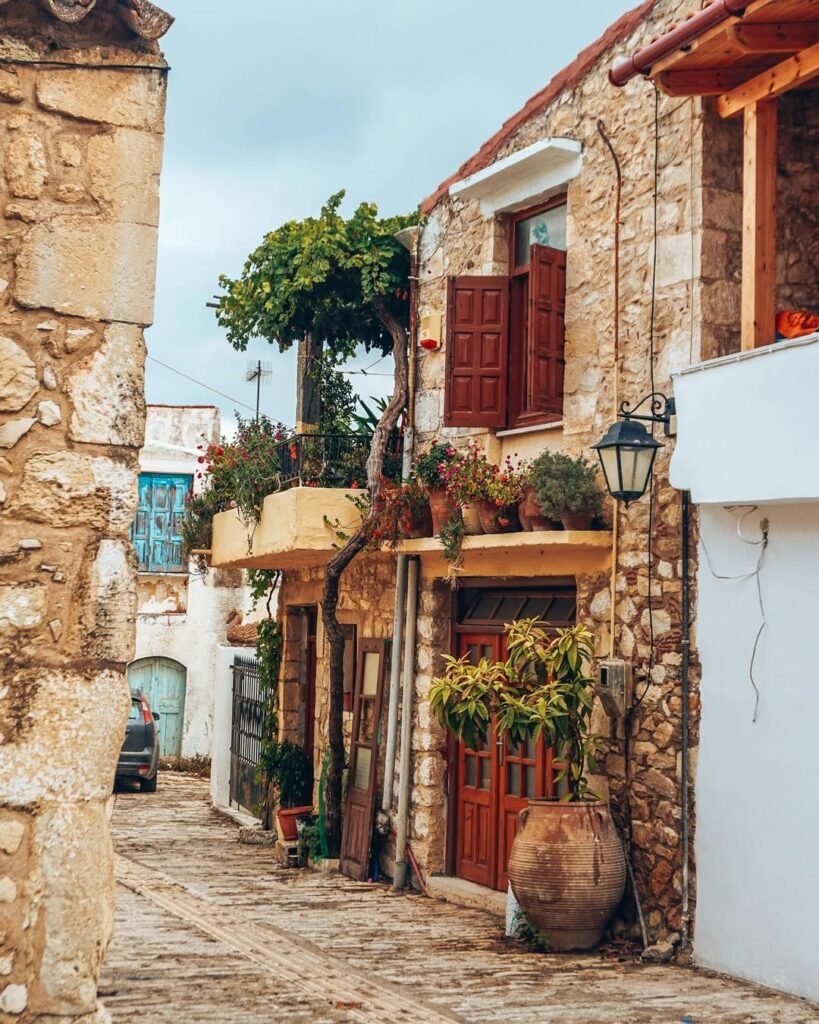 Wander through the quiet streets of Margarites and you’ll find blooming balconies, stone façades, and timeless corners that whisper stories of Crete’s past.