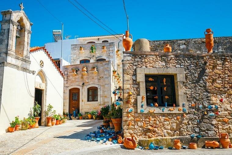 A colorful street in Margarites, one of Crete’s most famous pottery villages and a stop on the full-day tour from Chania.