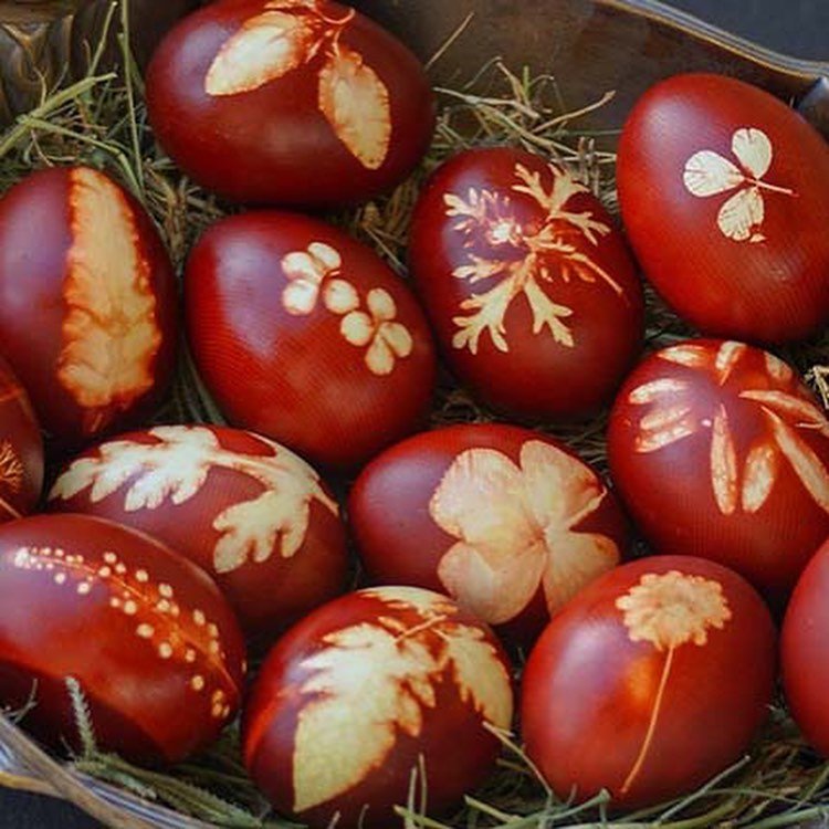 On Holy Thursday during Orthodox Easter in Crete, eggs are dyed red to symbolize the blood of Christ. Some families use natural methods—wrapping herbs or flowers around the eggs for decorative imprints that blend faith with folk tradition. 