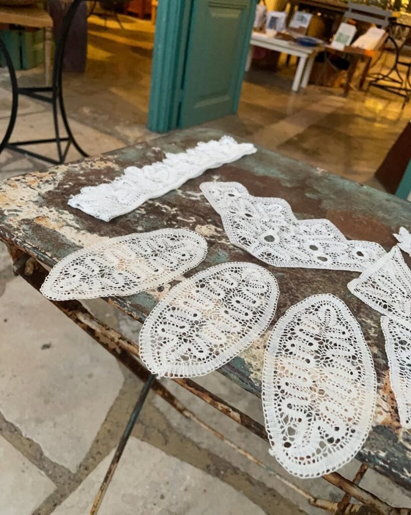 Discover the timeless beauty of handwoven Kopaneli lace, crafted with precision and tradition in a quaint Cretan village. 