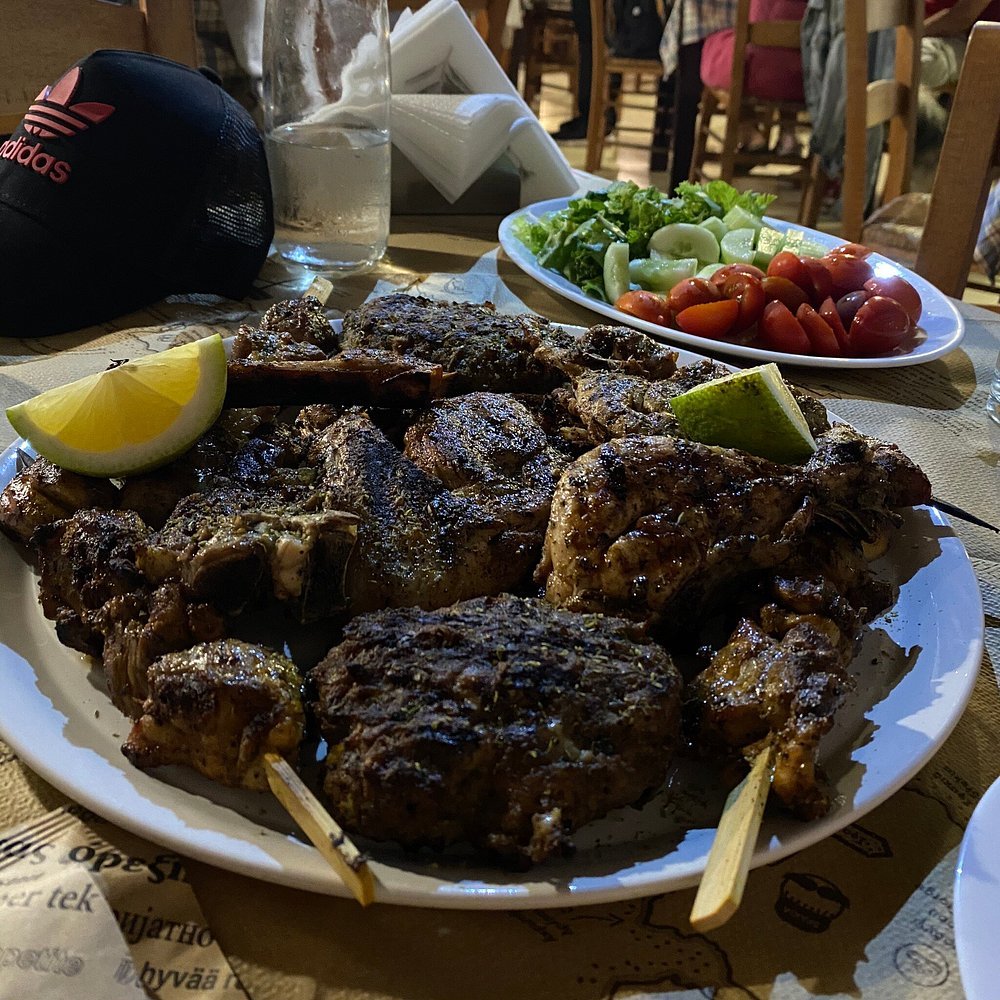 Generous mixed grill platter at Kalypso Taverna, a favorite among restaurants in Chania for meat lovers.