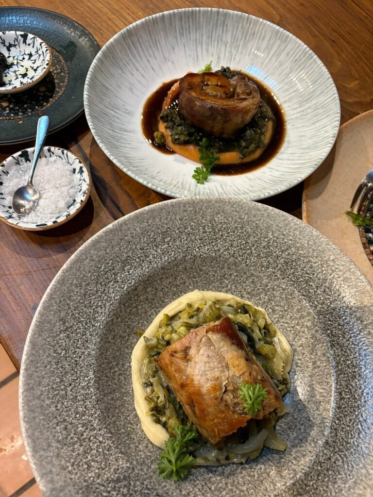 Traditional Cretan cuisine meets rustic elegance at Milia Mountain Retreat, where every dish is crafted with local, organic ingredients and served with a view of the forested mountains.