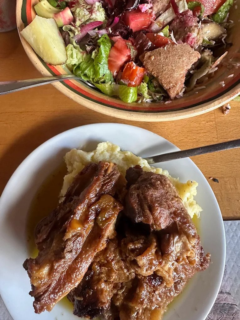 Farm-to-table at its finest—traditional wood-fired cooking and garden-fresh salads at Ntounias in the foothills of the White Mountains.