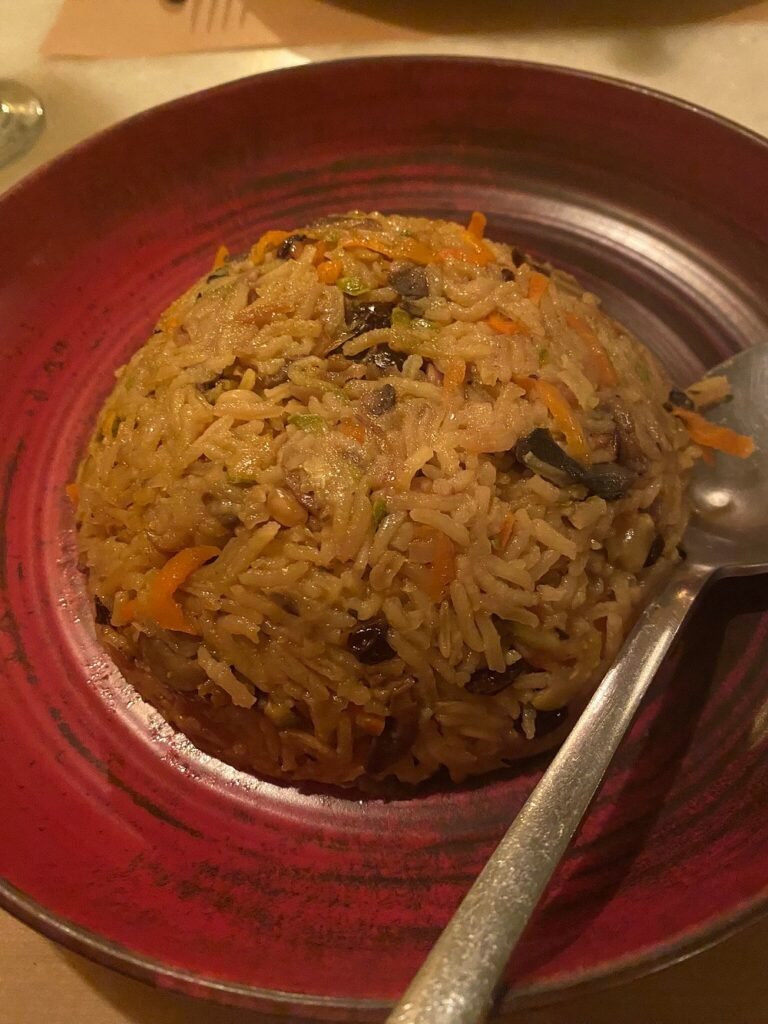 Aromatic Iranian rice with vegetables, reflecting Tamam’s unique blend of Cretan and Middle Eastern flavors.
