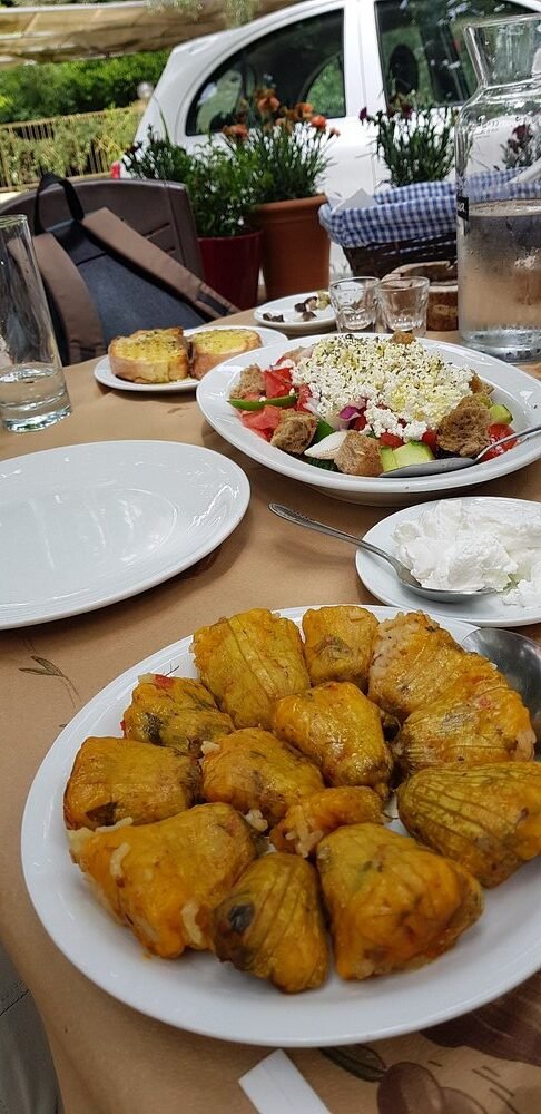 Stuffed courgette flowers and a classic Cretan salad served at To Faragi Tavern in Deliana.
