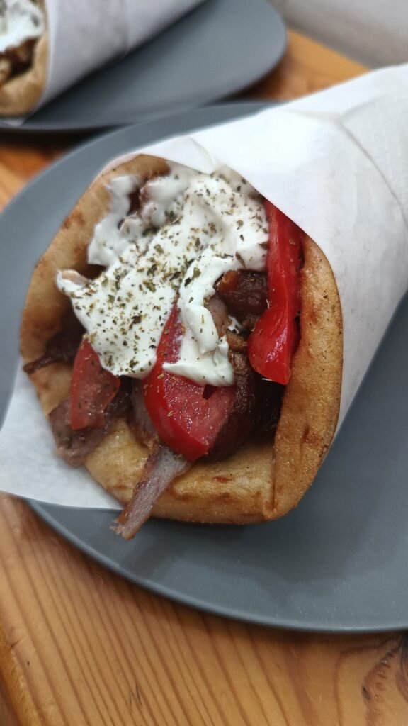 Perfectly wrapped, generously filled, and full of flavor—this gyros from To Souvlaki Opos Palia is a Chania must-try.