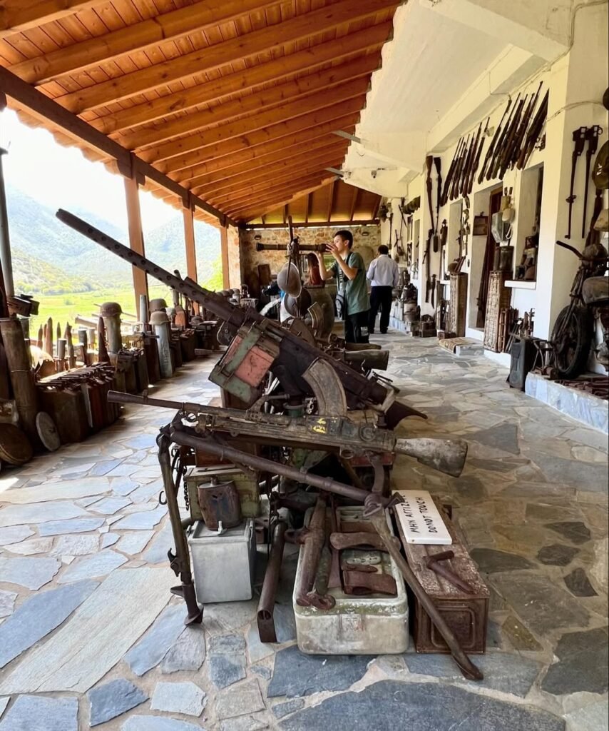 The extensive weapons collection at the Askyfou War Museum sprawls across interior rooms and covered porches, creating an immersive experience that brings WWII history to life in the mountains of Crete. 