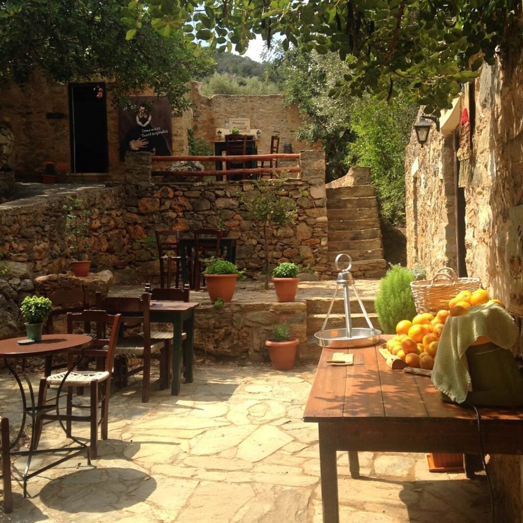 The peaceful courtyard at El Greco's Birthplace Museum in Fodele village provides a tranquil setting surrounded by orange groves where visitors can contemplate the legendary artist's Cretan origins.