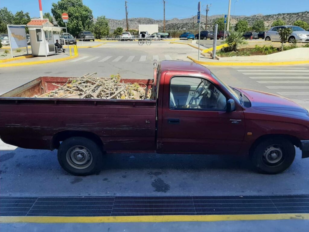 Only a true local would have the confidence to park like this right in front of Chania Airport! While tourists stress about finding official parking spots, this driver clearly knows something we don't.