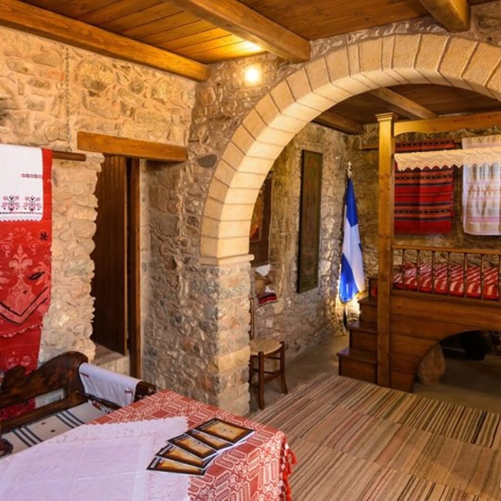 The beautifully preserved interior of the Kritsotopoula Museum in Kritsa recreates 19th-century Cretan home life with authentic furnishings and traditional textiles that bring Rodanthi's world to life. 