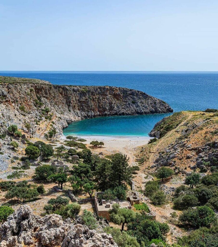 Menies Beach represents the ultimate off-grid adventure among Crete's hidden coastal treasures, where ancient Diktynna sanctuary ruins meet pristine turquoise waters on the remote Rodopou Peninsula. This secluded paradise offers complete solitude and a connection to ancient history that makes the challenging 4x4 journey absolutely worthwhile.