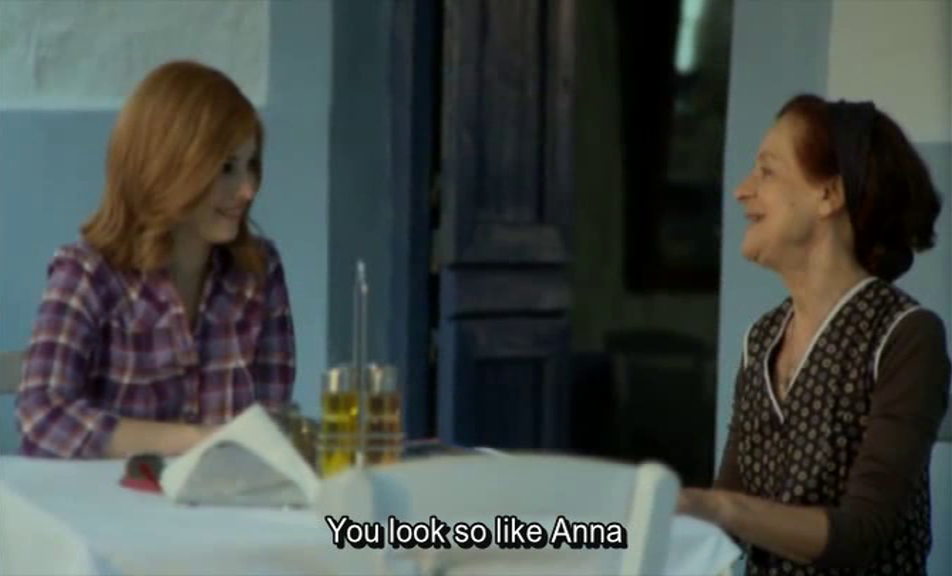 Alexis meets Fotini in Plaka, the wise storyteller who unveils the hidden secrets of her family's tragic history connected to Spinalonga. All rights to footage and images from 'To Nisi' (Το Νησί) belong to Mega Channel (MEGA TV).