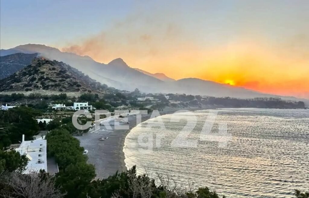 Smoke from the devastating fires in southeastern Crete creates an apocalyptic orange glow over Ierapetra on July 3rd, 2025. This is not the sun rising, but the reflection of massive flames in the sky. 