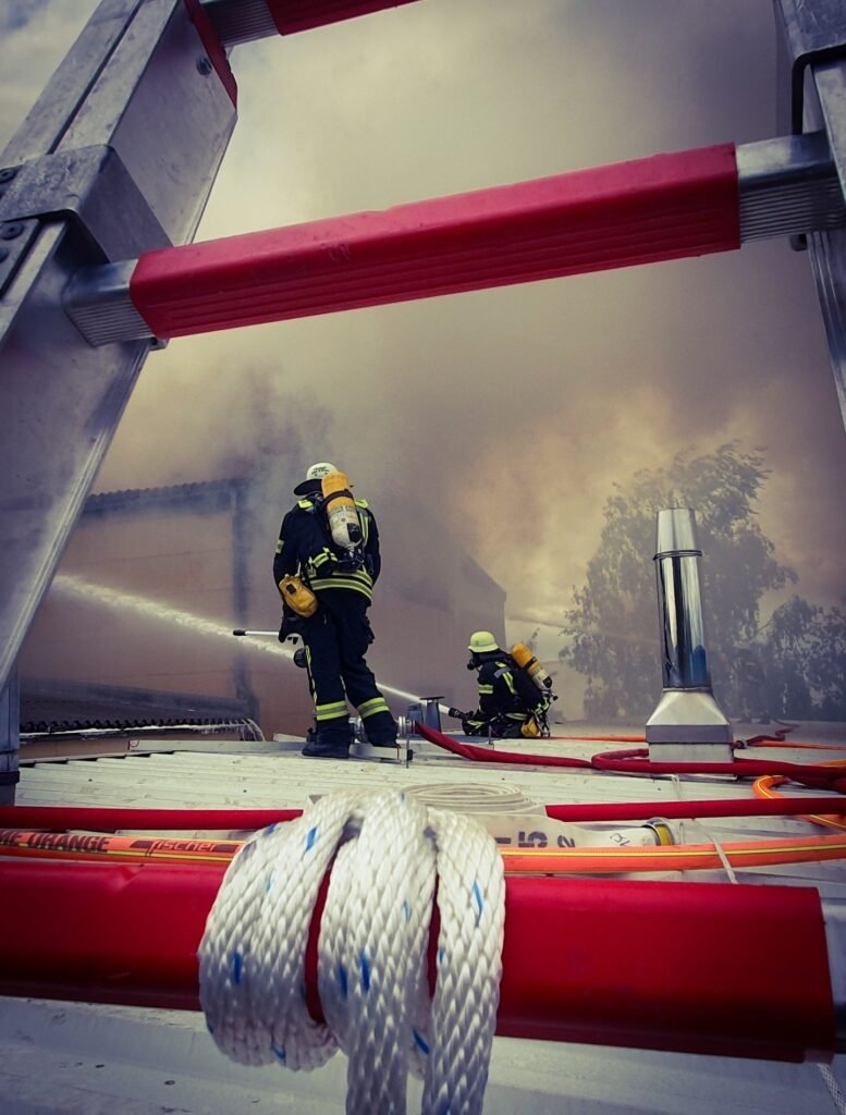Firefighters work tirelessly to battle the devastating fires in southeastern Crete on July 2nd, 2025, as thick smoke engulfs the area. Over 230 firefighters are deployed across multiple fronts to contain the blaze. 