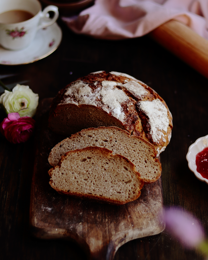 Artisanal bread from Stamatakis Bakery in Heraklion, where wood-fired ovens and ancient grains create rustic loaves that connect modern diners to Crete's agricultural heritage and traditional baking methods.