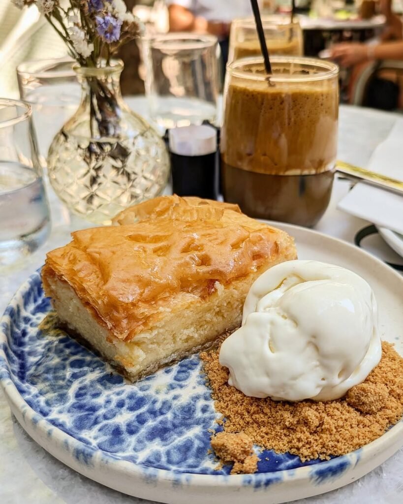 Golden layers of crispy phyllo and creamy custard make galaktoboureko an irresistible treat soaked in fragrant citrus syrup.
