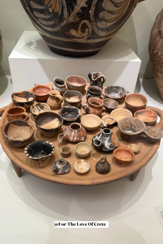 Miniature Minoan pottery and vessels at the Heraklion Archaeological Museum, evidence of the craftsmanship that filled daily life thousands of years ago.